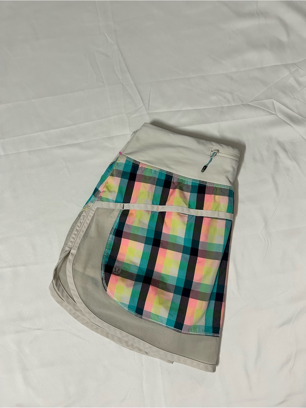 Multicolor and Cream Lululemon skirt with black, teal pink yellow stripes